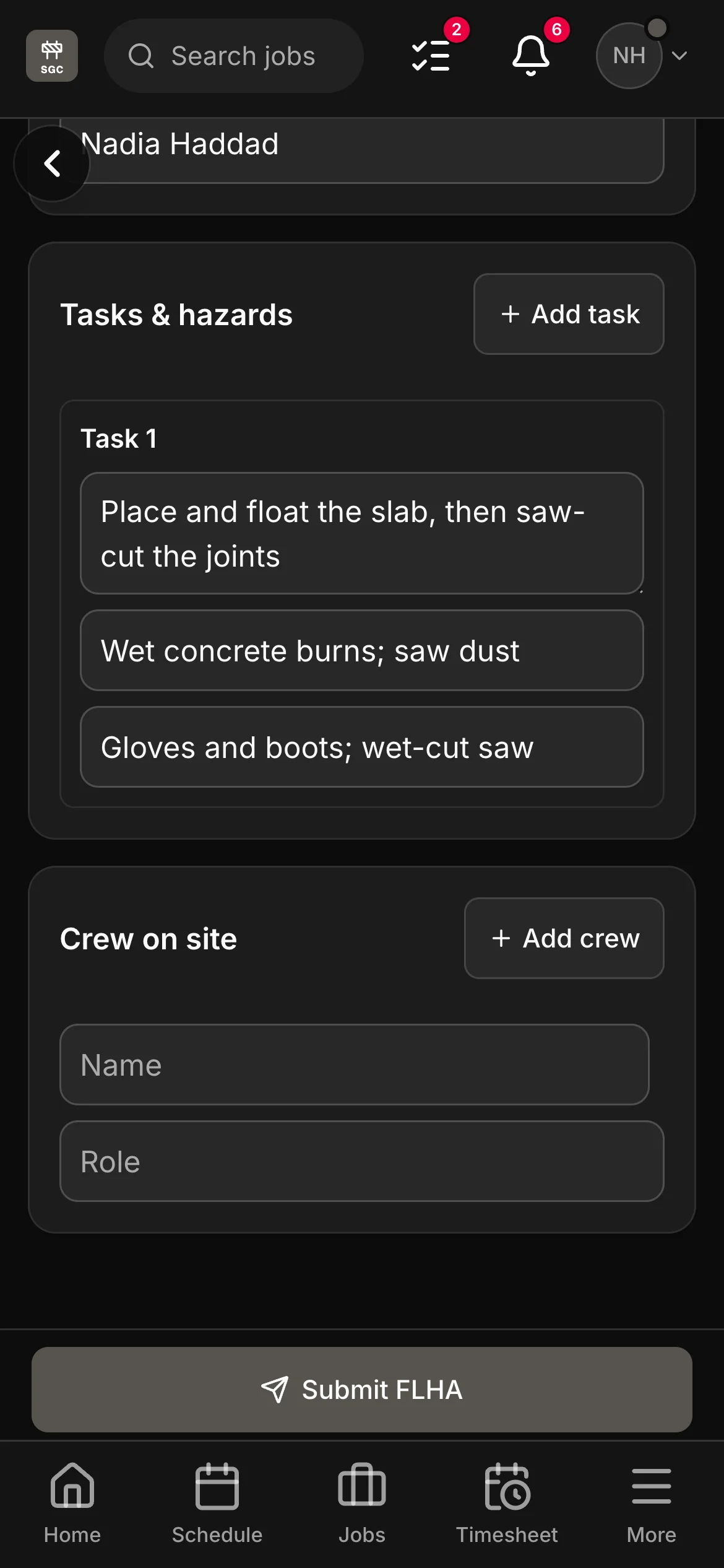An FLHA in the crew app, “Place and float the slab, then saw-cut the joints”: the task with its hazard and its control, and the crew on site under it.