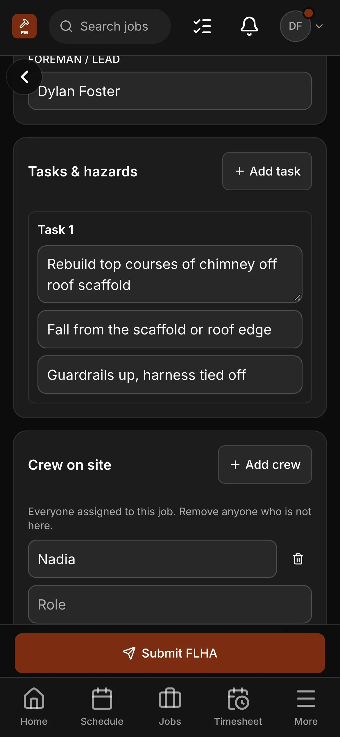 The FLHA on a crew member’s phone: the foreman, the conditions, and a task — rebuilding a chimney’s top courses off a roof scaffold — with its hazard and its control, and the crew on site under it.