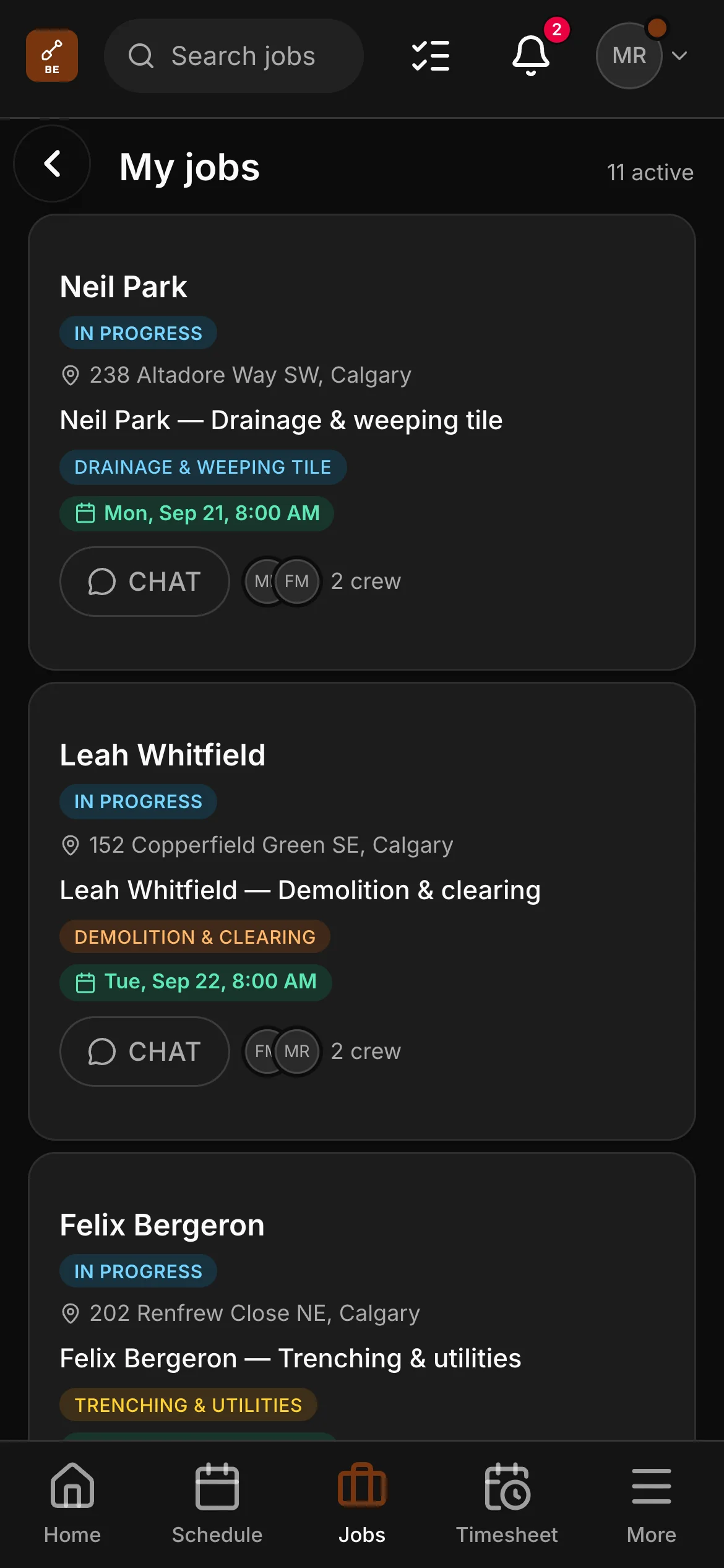 A crew member’s list in the crew app, 11 active: “Neil Park — Drainage & weeping tile” and “Leah Whitfield — Demolition & clearing” among them, each with its address and its time.