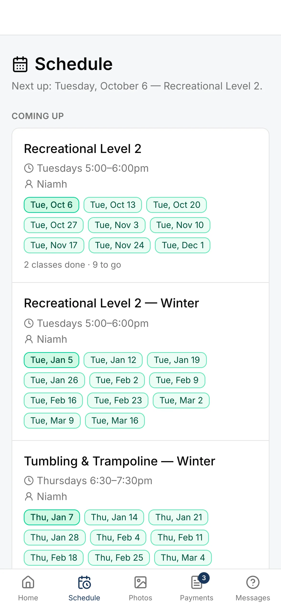 The family portal’s schedule on a phone: every class the child is in this term and next, each date shown, to tap when they will miss it.