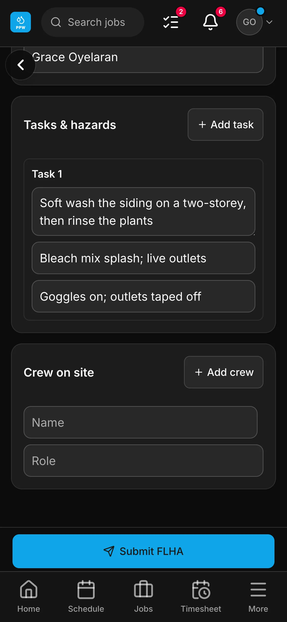 An FLHA in the crew app, “Soft wash the siding on a two-storey, then rinse the plants”: the task with its hazard and its control, and the crew on site under it.