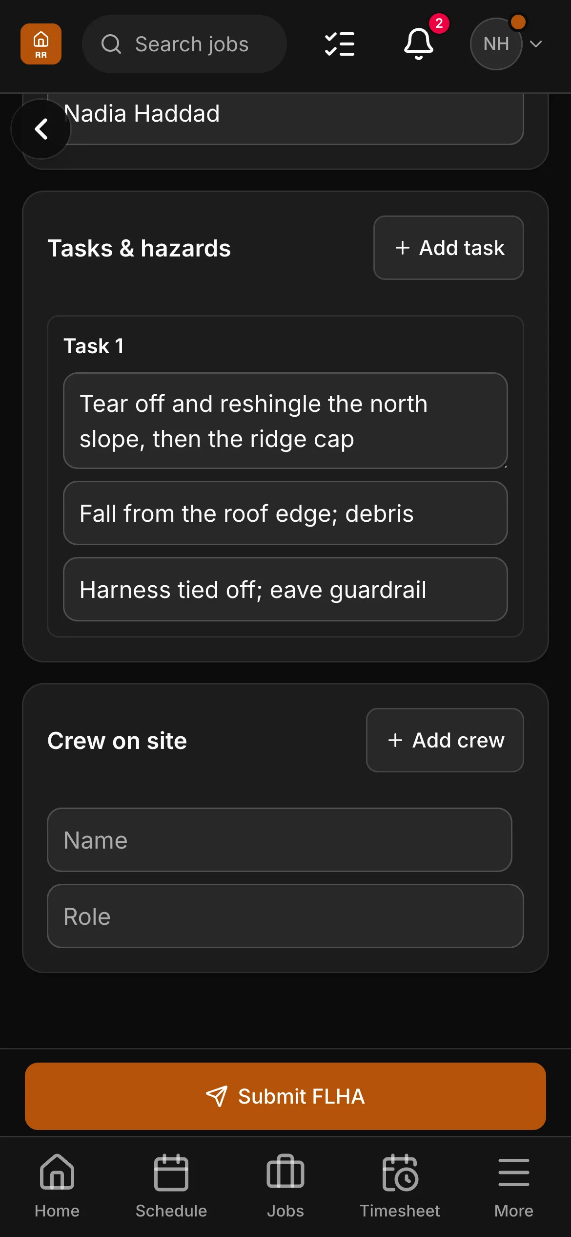 An FLHA in the crew app, “Tear off and reshingle the north slope, then the ridge cap”: the task with its hazard and its control, and the crew on site under it.
